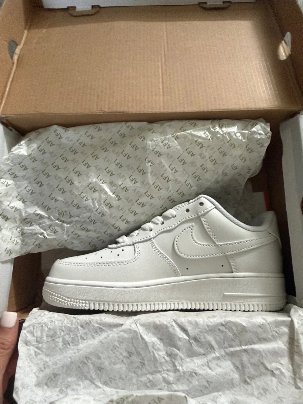 Air Force 1’s Men’s White Low-Top Sneakers